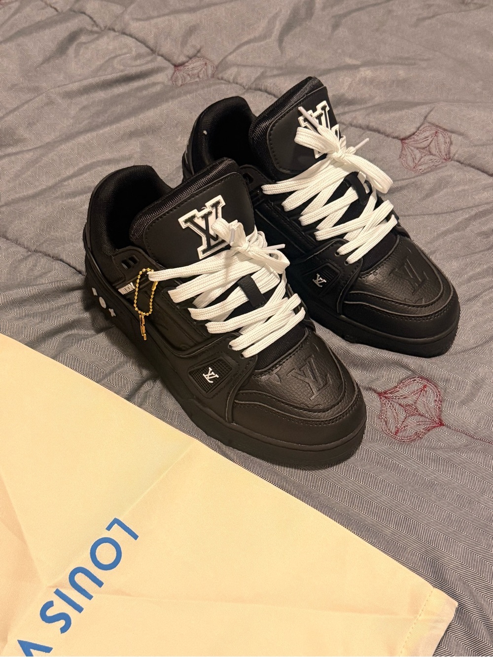 Louis Vuitton Black Sneakers with White Laces and Gold Charm